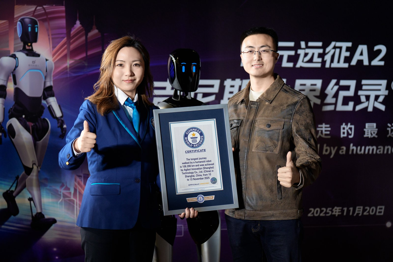 okpay远征A2完成全球首次人形机器人百公里跨省行走，获吉尼斯世界纪录™认证！